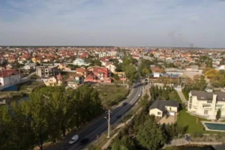 Casele si apartamentele din zonele apropiate Capitalei au cunoscut cele mai spectaculoase scaderi de preturi din tara